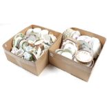 2 boxes with various porcelain and earthenware crockery parts