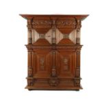 Antique oak 3-part cabinet with 4 doors and 2 large drawers, Completely decorated with masks and