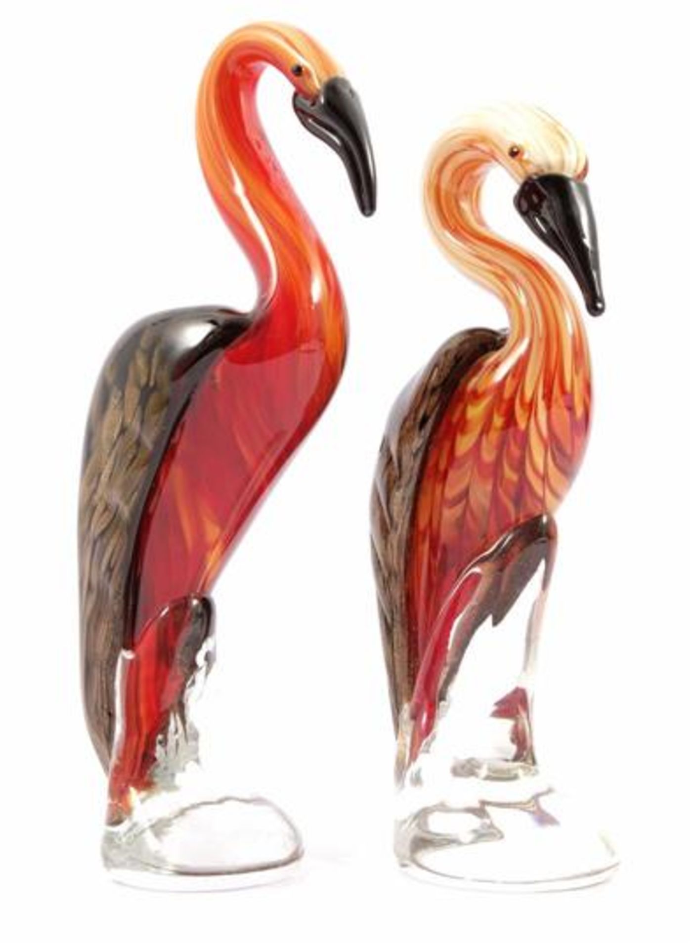 2 colored glass cranes 30 cm and 33 cm high
