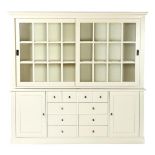2-part white cabinet with 2 doors, 10 drawers and shelves behind the 2 sliding doors, 210 cm high,