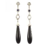 White gold earrings, 14 krt., Set with onyx, sapphire and diamond, approx. 0.66 ct.