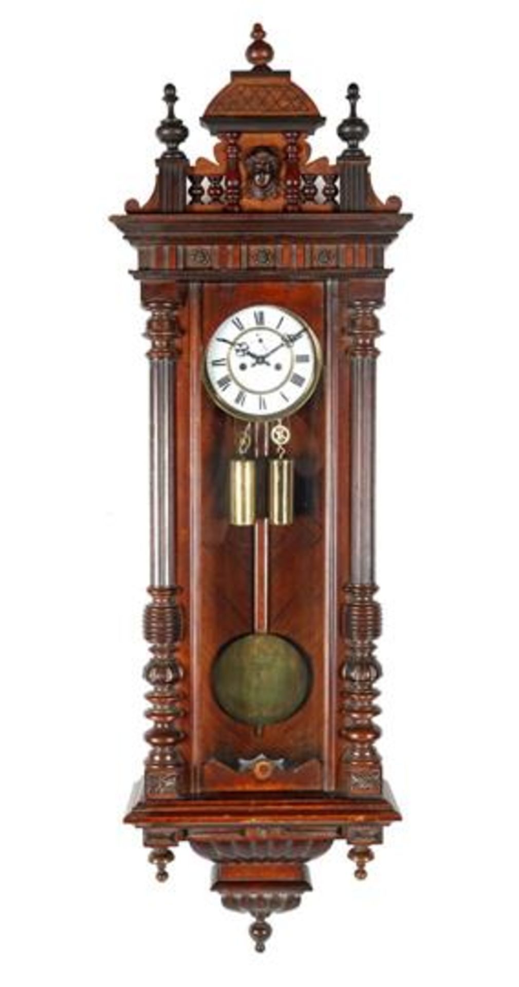 Regulator in richly decorated walnut case with crest, 142 cm high (eyelet on front side missing)