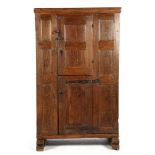 Antique oak cabinet, standing on slippers and fitted with 2 doors, Holland ca.1620, 156 cm high,