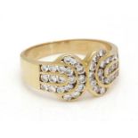 Gold fantasy ring, 18 kt, set with brilliant cut diamond, approx.0.78 ct, buckle model, 16 mm