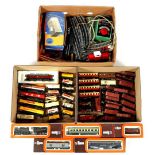 3 boxes with 50 locomotives and wagons and various rails, transformer and booklets