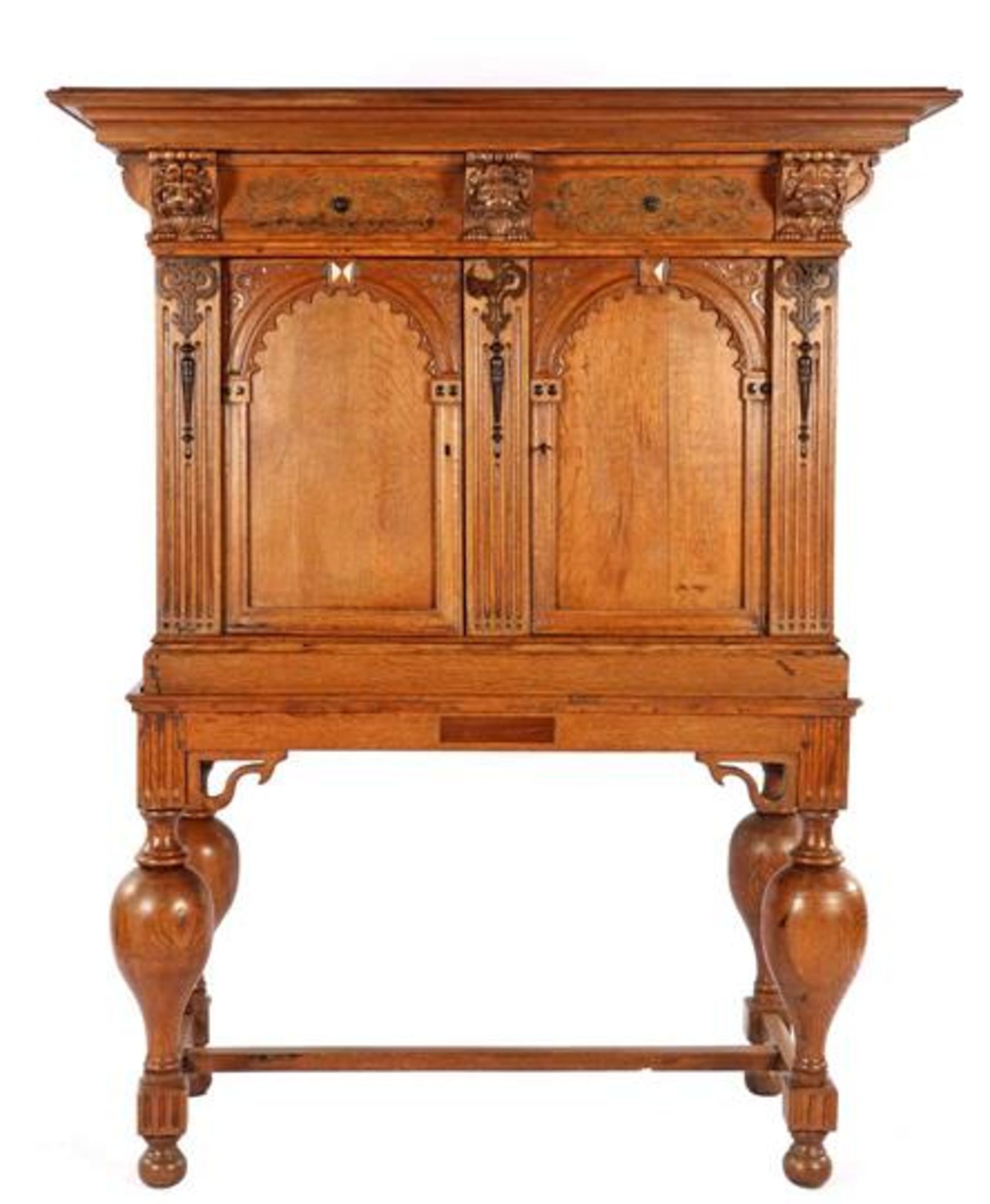 Antique oak 2-part cross-legged cabinet, Renaissance with carved frieze, lion masks and porch doors,