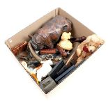 Box of various curiosities including statue of a hippo