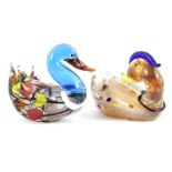 2 decorative glass objects of ducks, 15 cm high