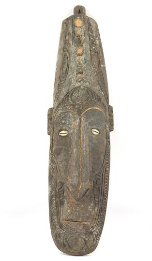 Elongated African wooden face, 85 cm high