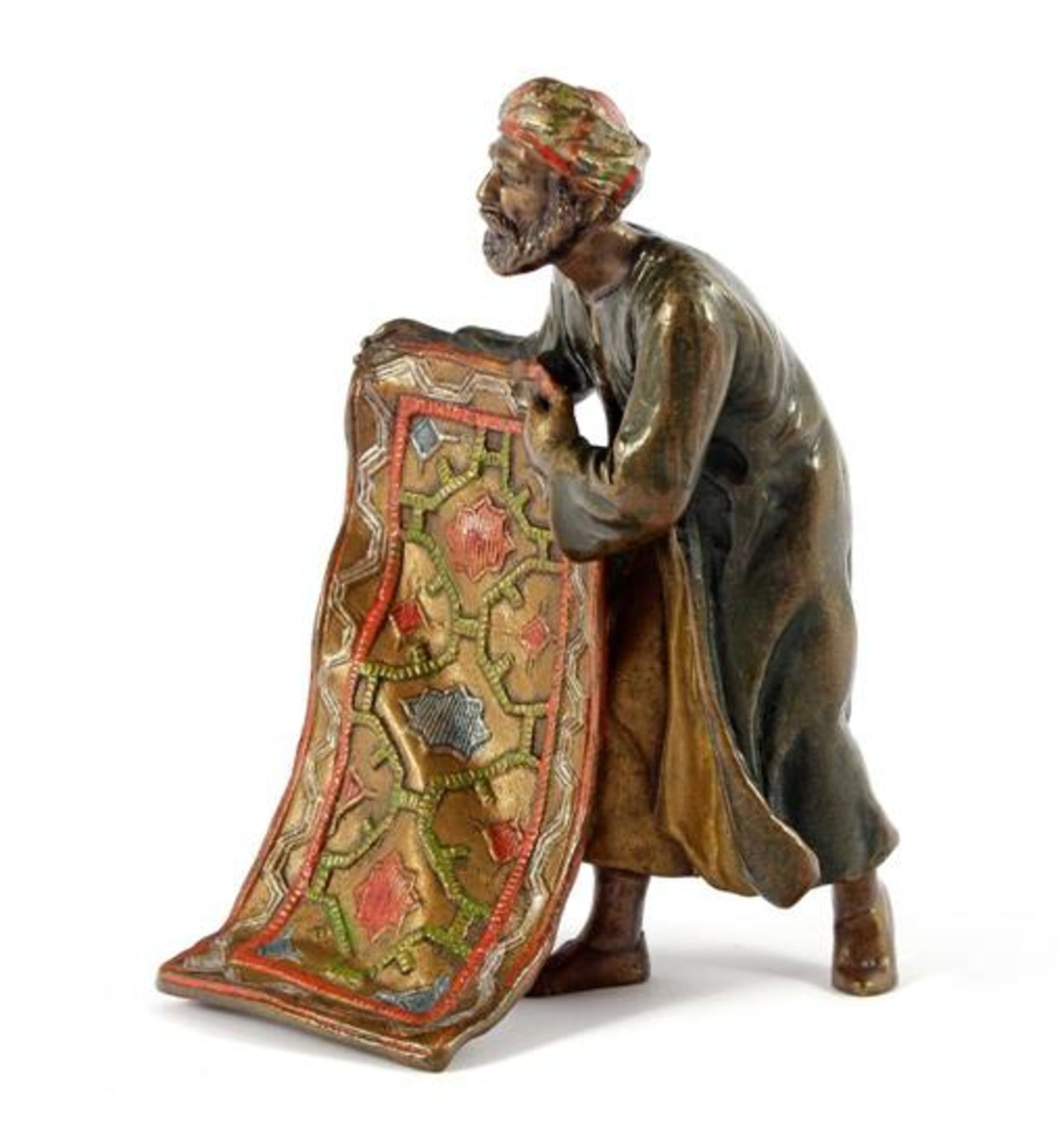 Viennese bronze statuette of an Arab with carpet, cold polychrome painted, with vague stamp of Franz