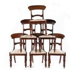 6 mahogany dining room chairs with striped upholstery on the seat