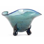 Blue colored glass bowl with wavy edge, standing on 3 legs 26 cm high, 42 cm diameter