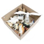 Box of various porcelain figurines of birds, including Quimper owl and Royal Dux penguin