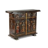 Spanish chestnut 2-door cabinet with poly stitching; chrome colored flowers in front and sides and 4