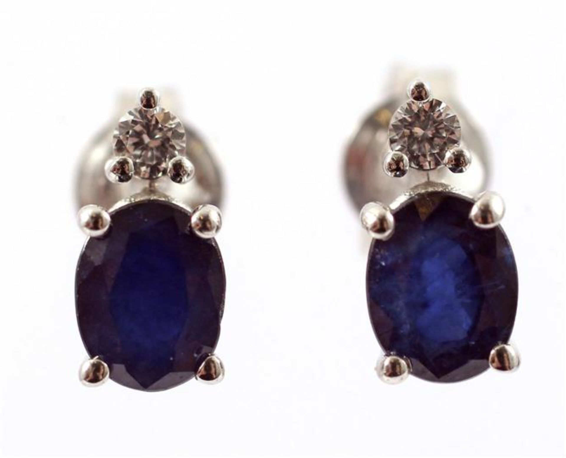 White gold ear studs, 18 kt, set with sapphire, approx.1.70 ct and brilliant cut diamond, approx.0.