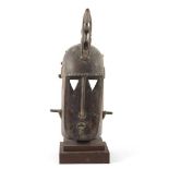 Wooden masked Dogon Mali mask, from before 1950, 47.5 cm high, 23 cm wide, on wooden stand