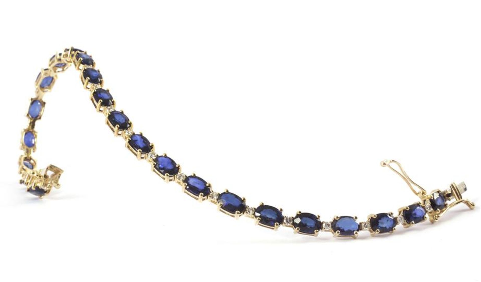 Gold fantasy bracelet, 18 krt., Set with sapphire approx. 11.00 ct. And brilliant cut diamond