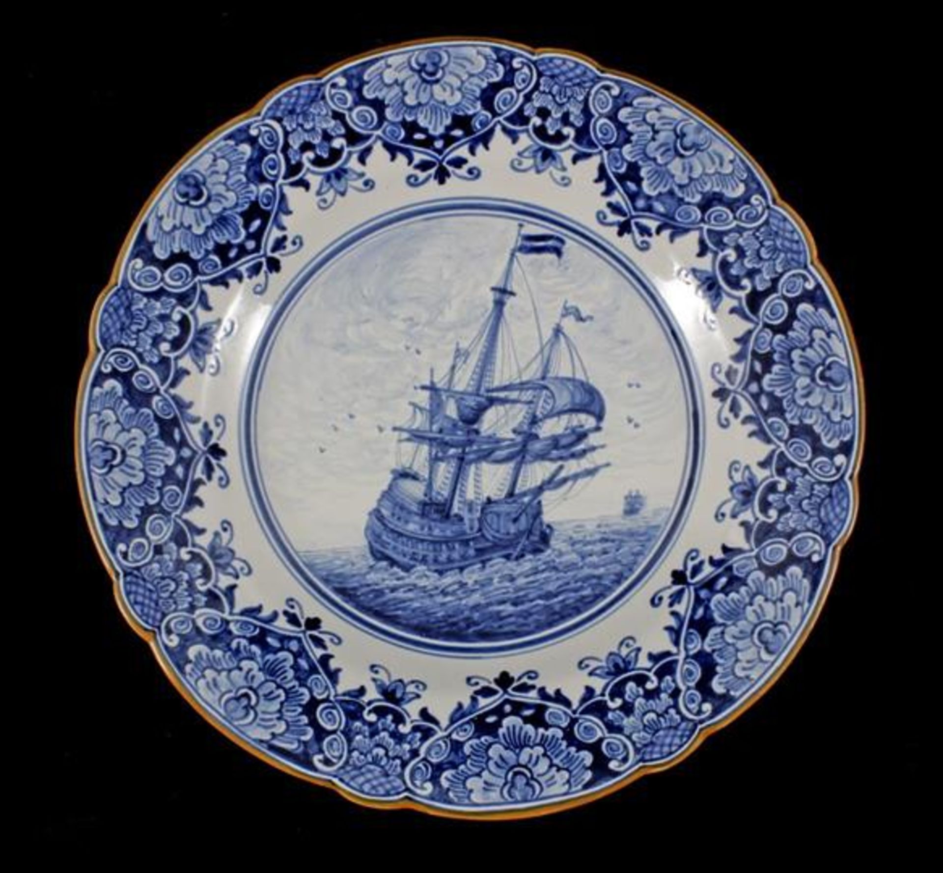 Tichelaar Makkum earthenware dish with blue decoration of galleon at sea, 35 cm diameter