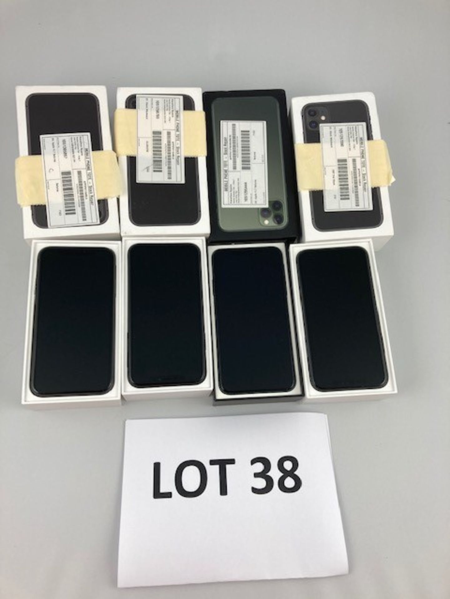 Box of 4 Apple Iphones. Latest selling price £ *3,336