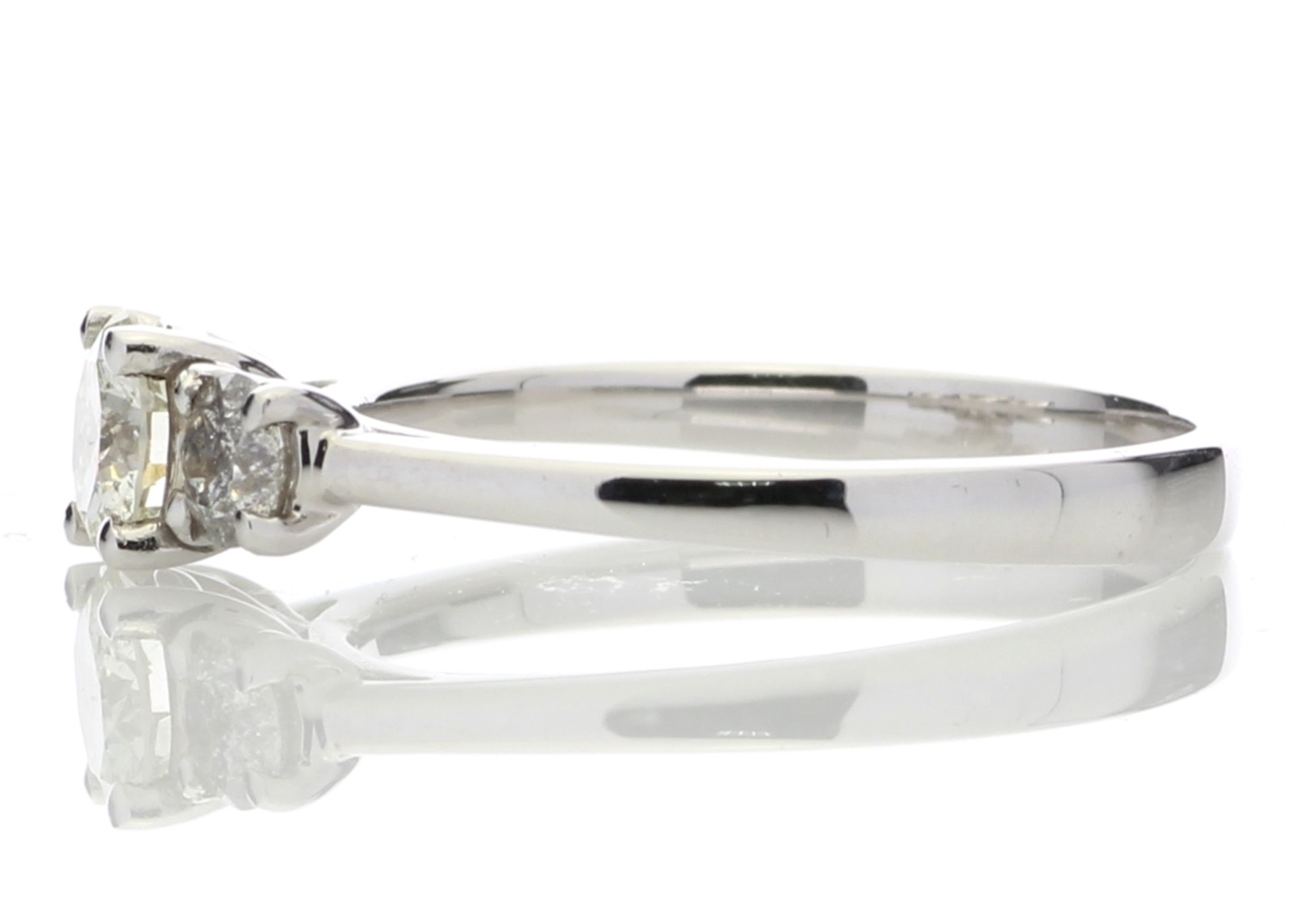 Valued by GIE £14,595.00 - 18ct White Gold Three Stone Claw Set Diamond Ring 0.77 Carats - - Image 3 of 5