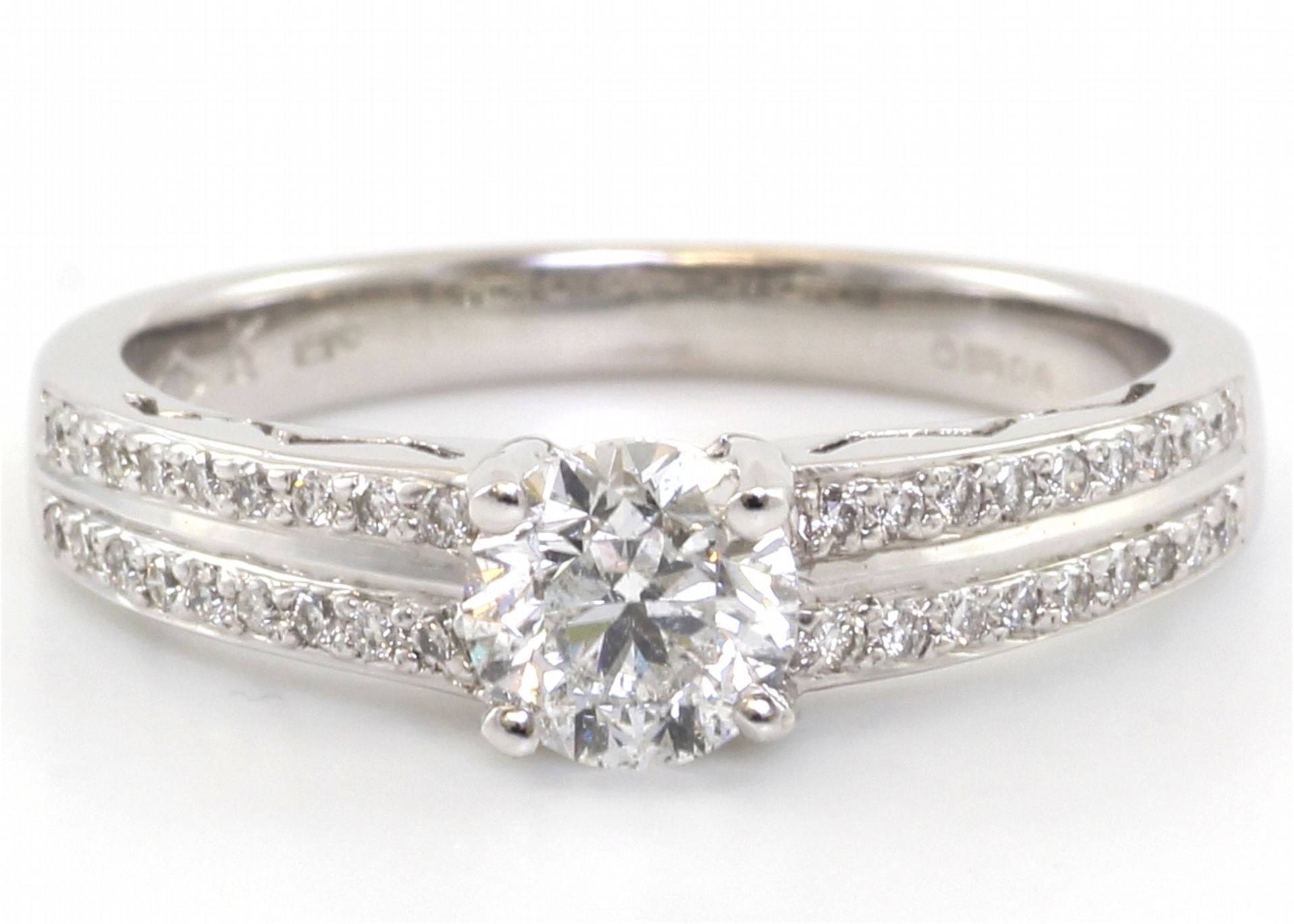 Valued by GIE £19,850.00 - 18ct White Gold Single Stone Diamond Ring With Double Chanel Set