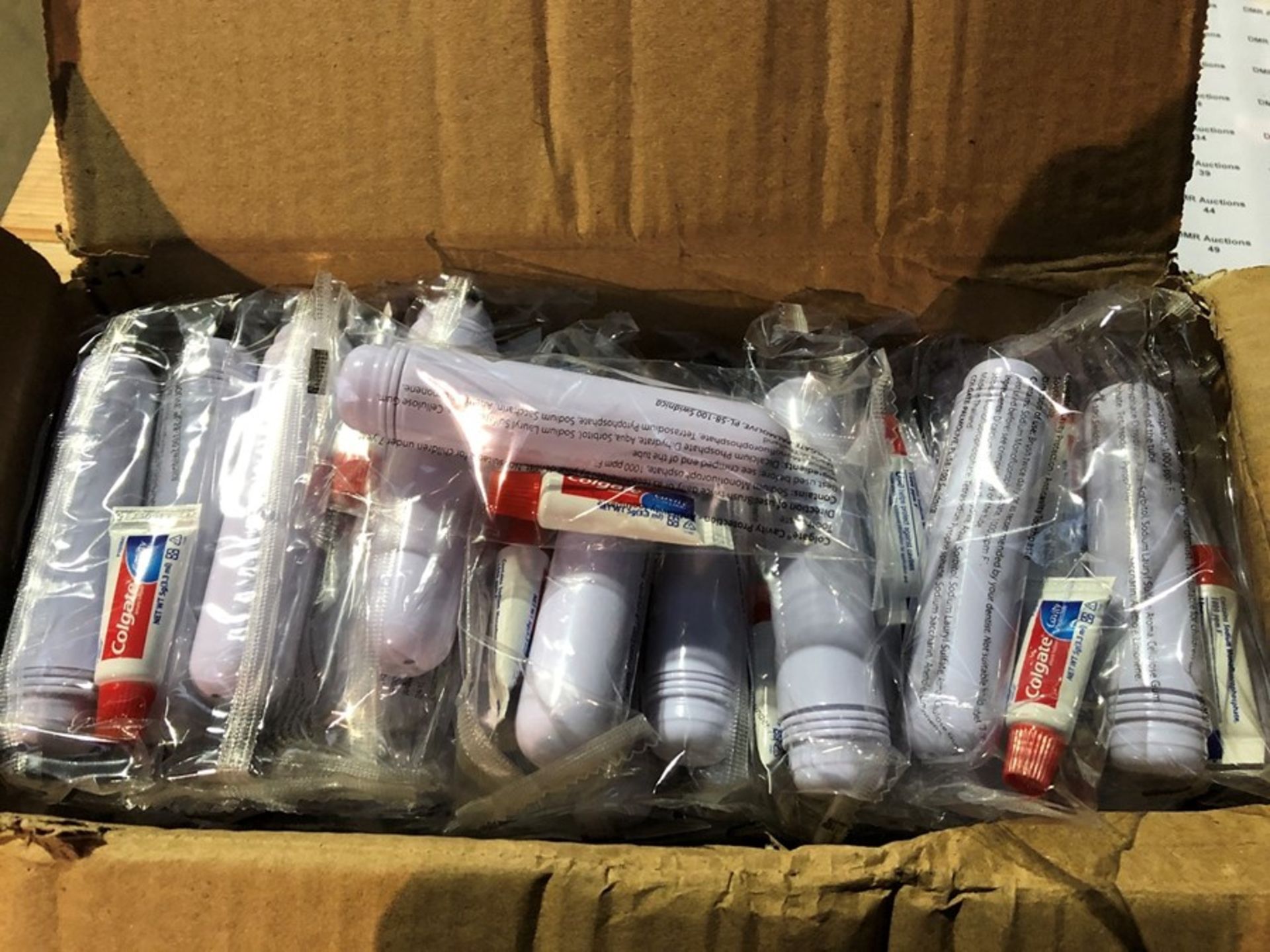 1 LOT TO CONTAIN A SMALL BOX FILLED WITH COLGATE TOOTHPASTE WITH PLASTIC TUBES (PUBLIC VIEWING