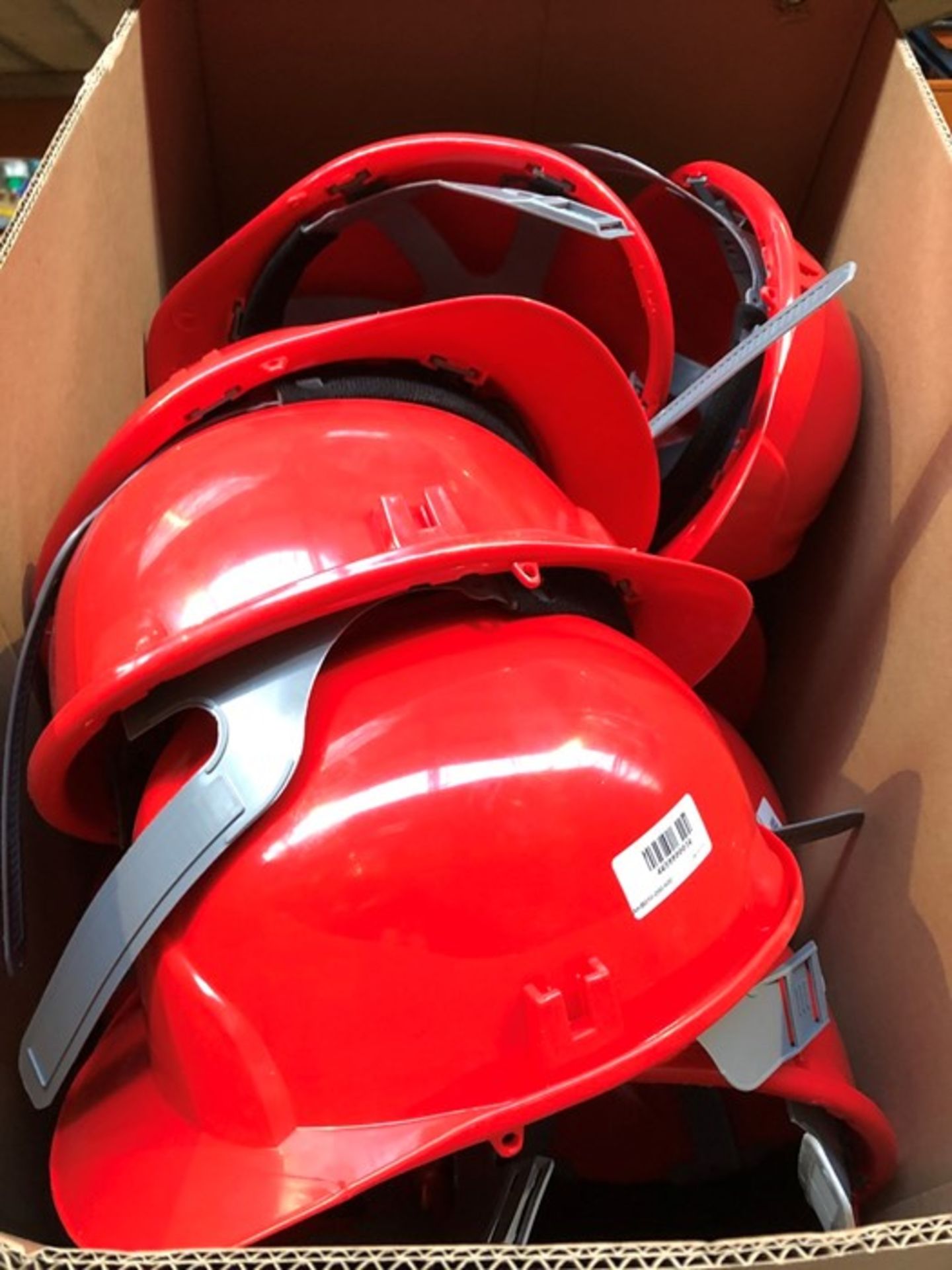 1 LOT TO CONTAIN AN ASSORTMENT OF JSP MANUFACTURING SAFETY HELMETS - RED (PUBLIC VIEWING AVAILABLE)