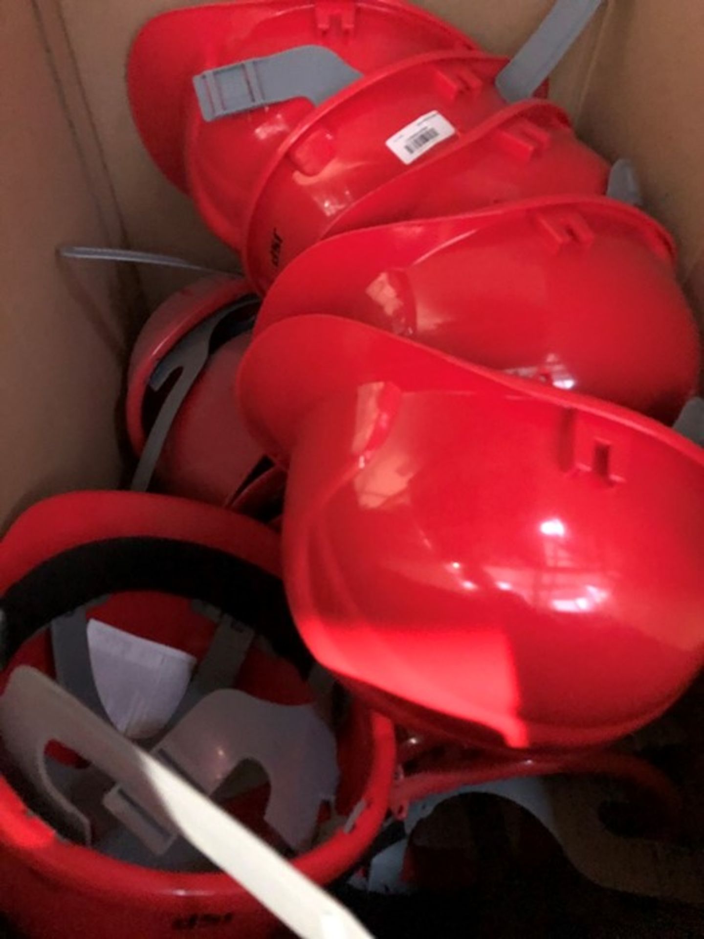 1 LOT TO CONTAIN A BOX FILLED WITH JSP MANUFATURING HELMETS - RED (PUBLIC VIEWING AVAILABLE)