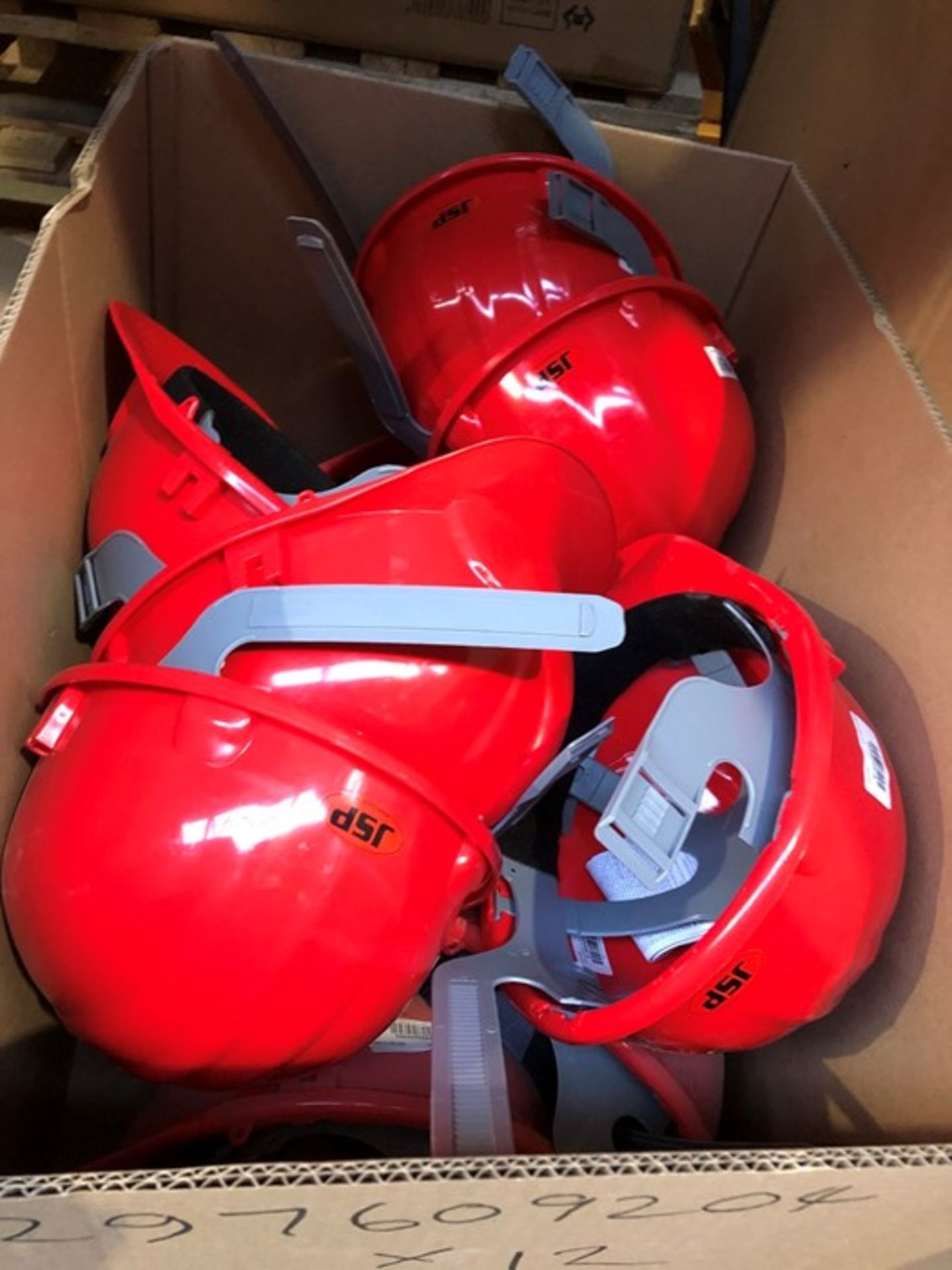 1 LOT TO CONTAIN A BOX FILLED WITH JSP MANUFATURING HELMETS - RED (PUBLIC VIEWING AVAILABLE)