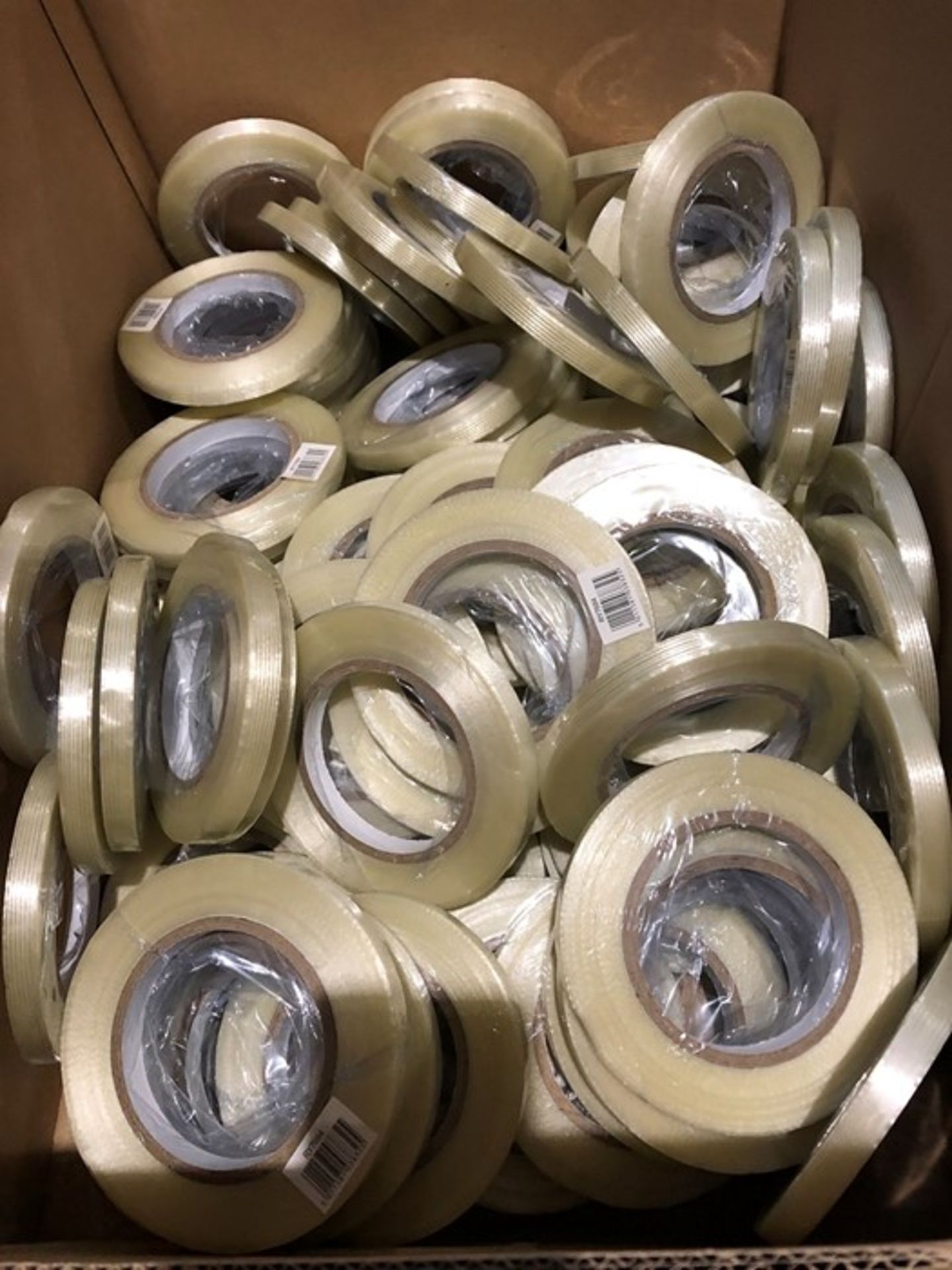 1 BOXED LOT TO CONTAIN A BOX FILLED WITH ROLLS OF FILAMENT TAPE / SIZE: 12MM X 50M (PUBLIC VIEWING