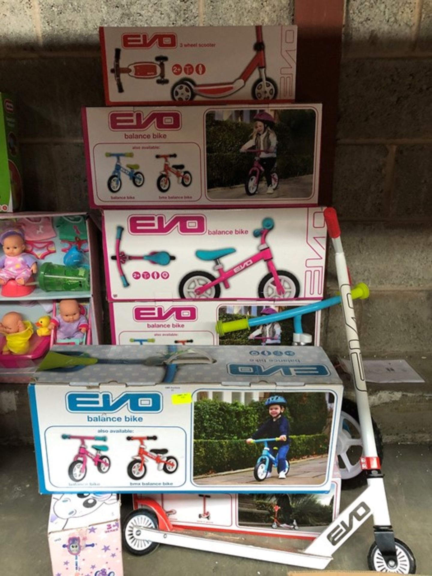 1 LOT TO CONTAIN AN ASSORTMENT OF EVO BALANCE BIKES AND SCOOTERS PUBLIC VIEWING AVAILABLE & HIGHLY