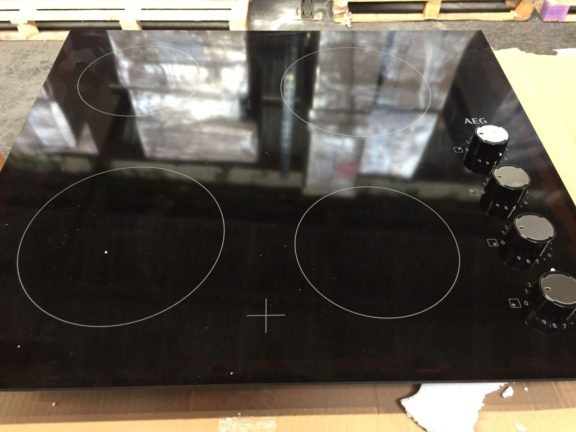 1 LOT TO CONTAIN AN UNTESTED AEG HK614000CB ELECTRIC HOB / RRP £245.00 / NO VISIBLE DAMAGE HOWEVER