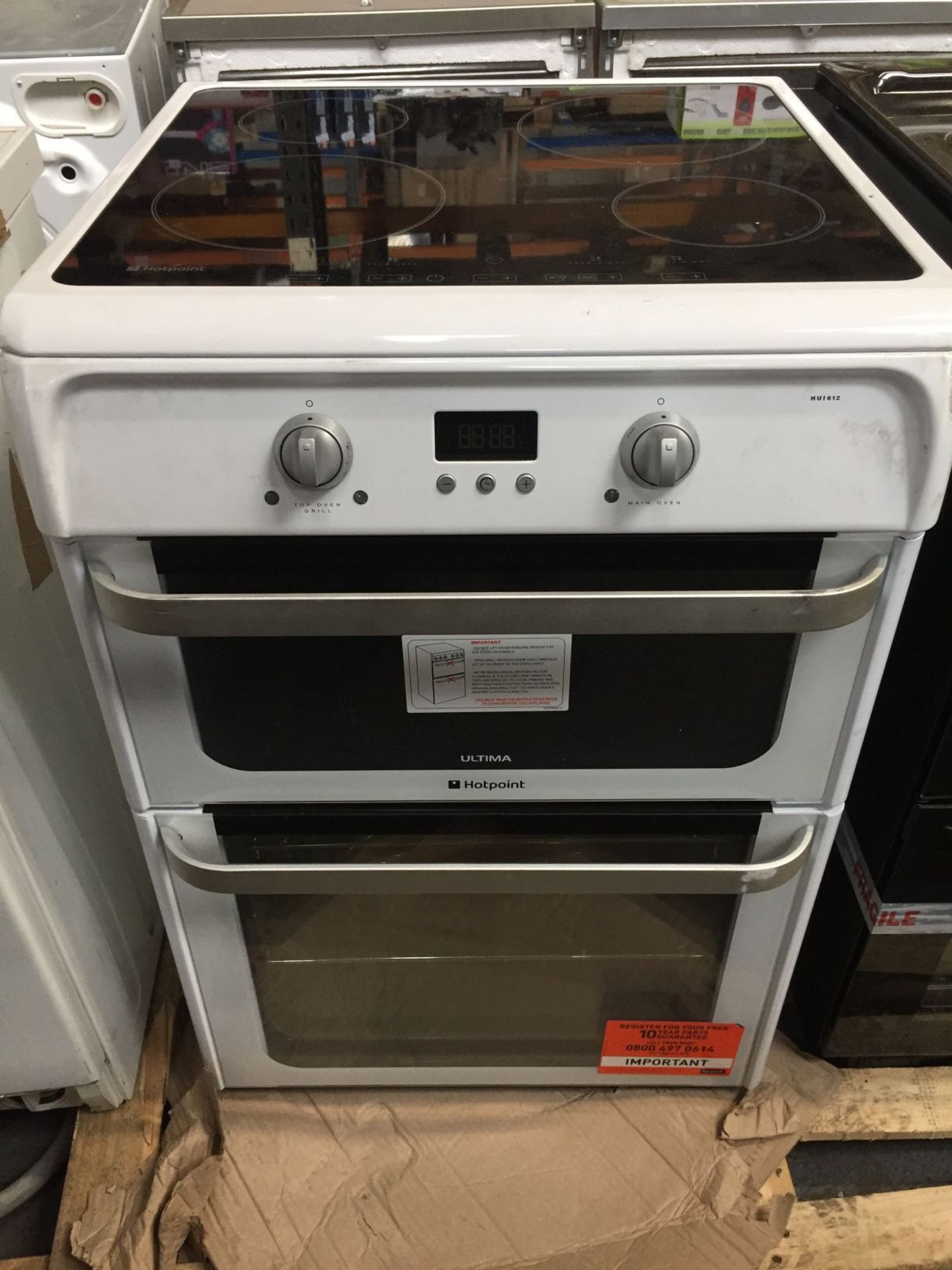 1 LOT TO CONTAIN AN UNTESTED HOTPOINT HUI612P ELECTRIC DOUBLE OVEN COOKER / RRP £499.00 / ITEM HAS