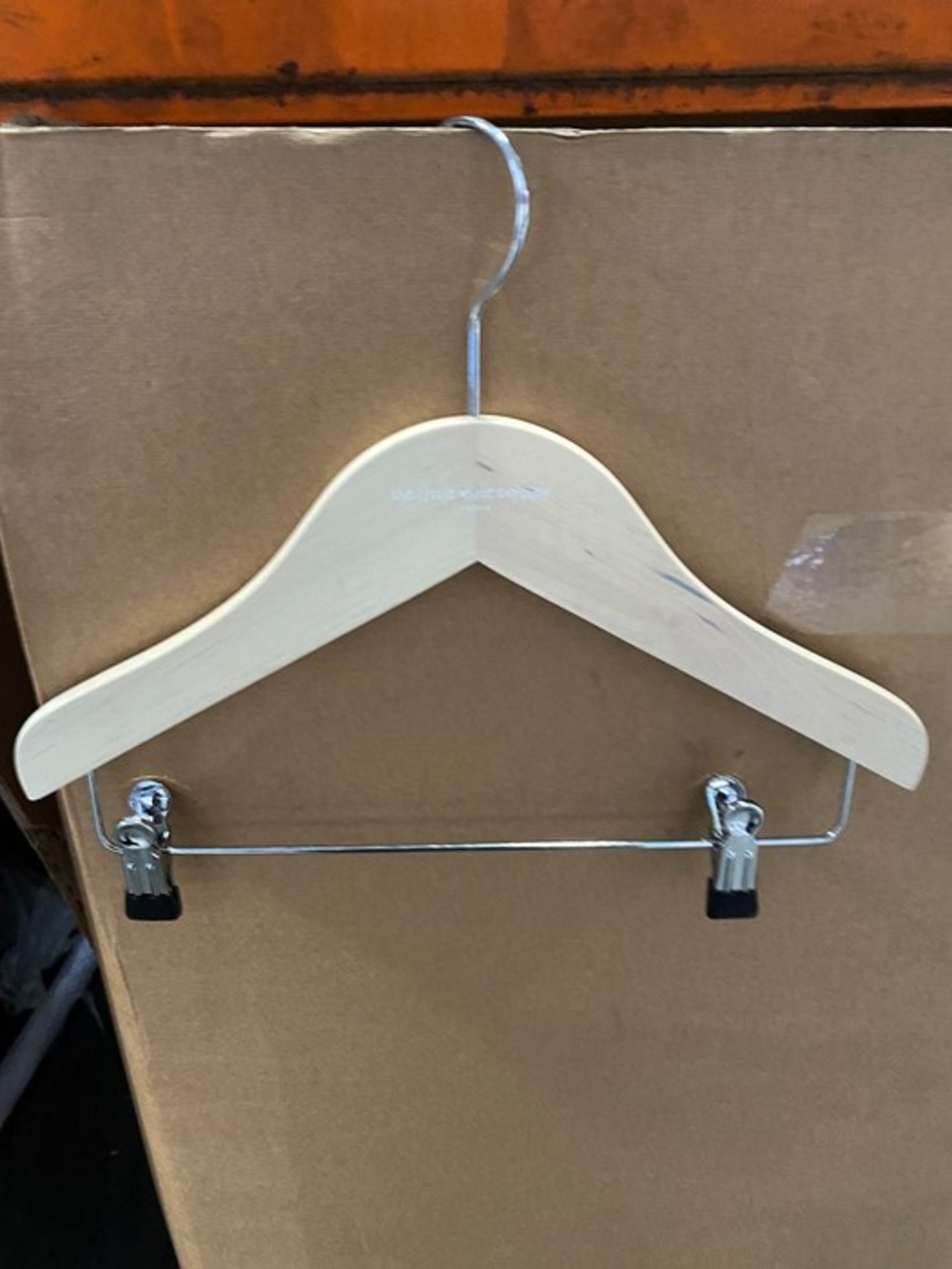 1 SMALL BOX FULL OF WOODEN COAT HANGERS BOXED