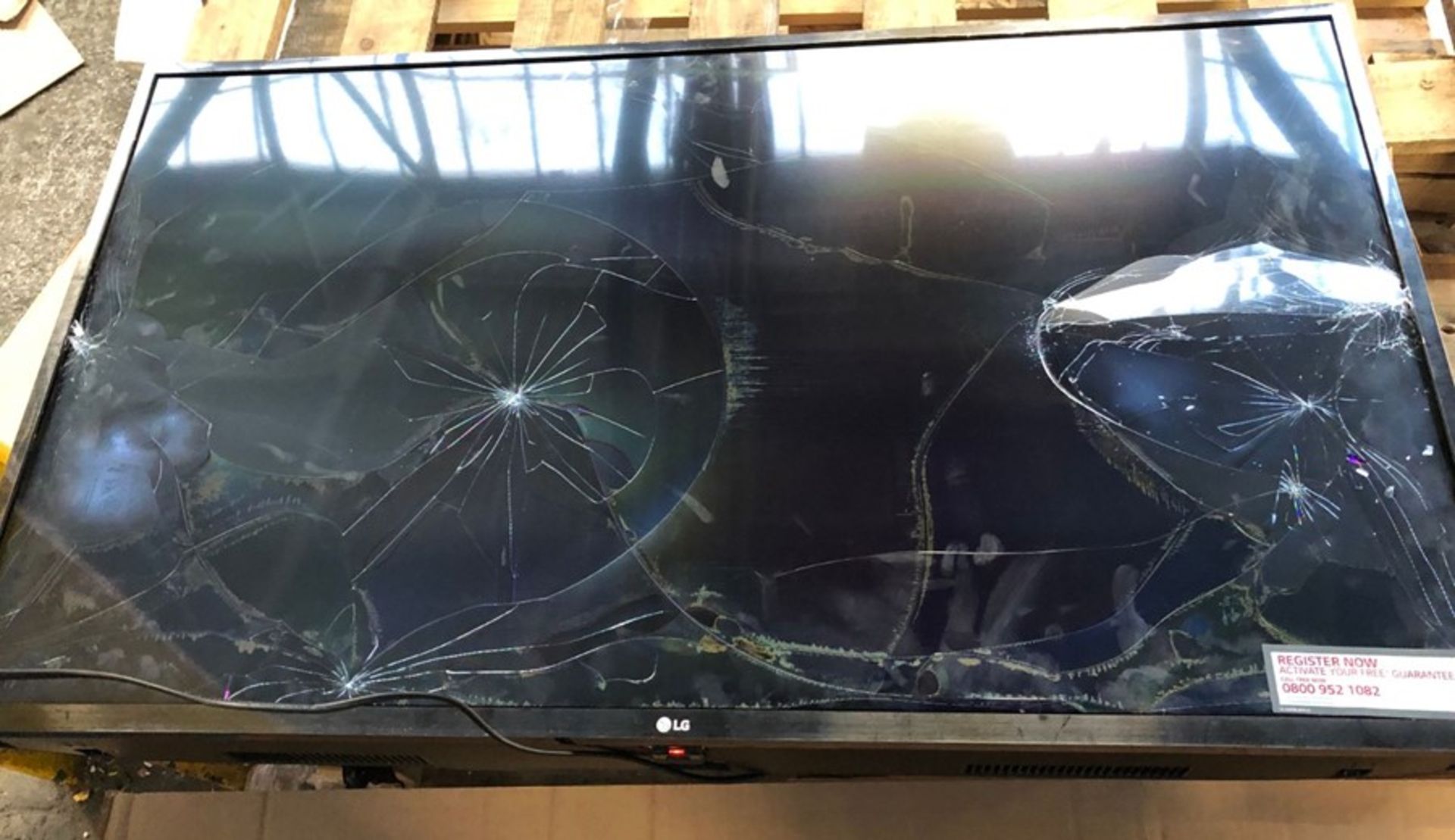 LG 43" SMART TV - 43M6300PLA / TESTED AND TURNS ON, SCREEN HEAVILY DAMAGED. COMES WITH TV STAND,