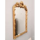 A late 19th century gilt mirror. 58cm in width by 92cm in height