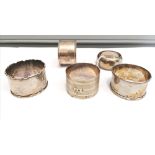 A collection of five various napkin rings. Approximately 90g