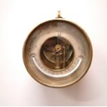 A 19th century brass cased holosteric aneroid barometer. 13.5cm