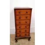 A 19th century miniature mahogany chest of drawers having six short drawers raised on cabriole legs.