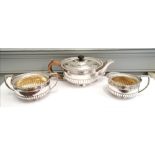 Three piece silver ovoid half lobed tea set with Gadroon decoration. London 1919, makers Daniel &