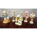 A set of royal Worcester figures, five of which are modelled by F.G. Doughty. Damage to hand on