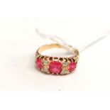 18ct Edwardian seven stone ruby and diamond ring c1900