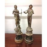 A pair of 19th century coal painted male and female mining figures. 29cm in height