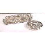 A Birmingham silver trinket box dated 1906 by B.C having foliage design to hinged lid containing a