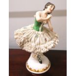 A late 19th century Ernst Bohne Dresden lace porcelain figure of a ballerina. 21cm in height