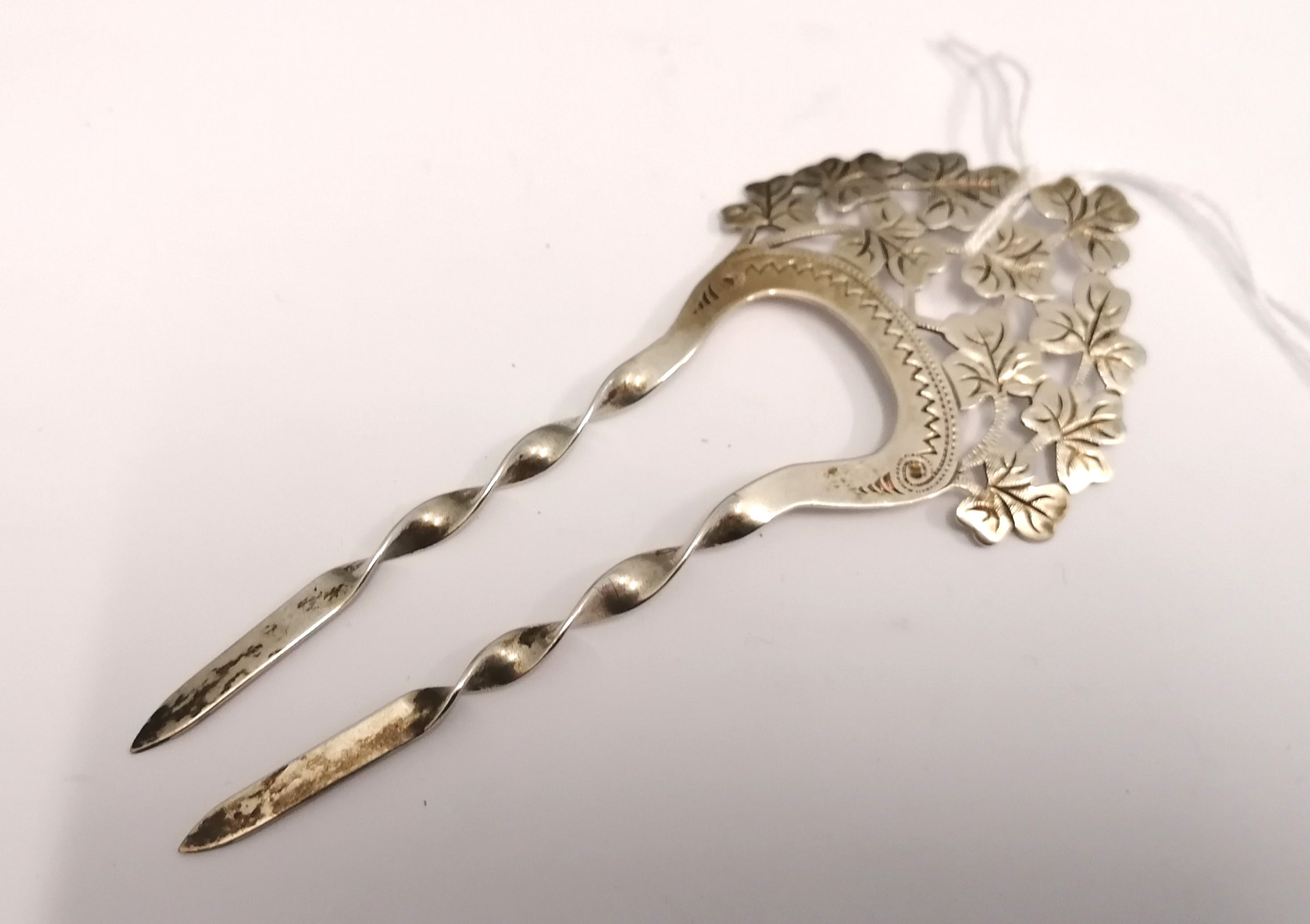 Silver floral pierced hairpin, Birmingham 4. Makers Reynolds & Westwood.
