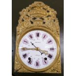 A 19th century Treluyet French wall clock having a brass surround enclosing a Roman numeral and