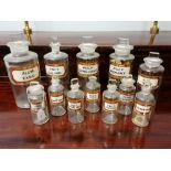 A collection of 19th century apothecary jars of various sizes. Twelve in total, one missing stopper