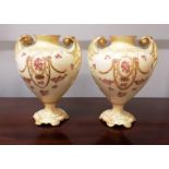 A pair of late 19th century urn shaped crown Devon vases. 20cm in height.