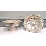 Fine pair of chased silver Victorian comports with floral decoration to the top rim and base,